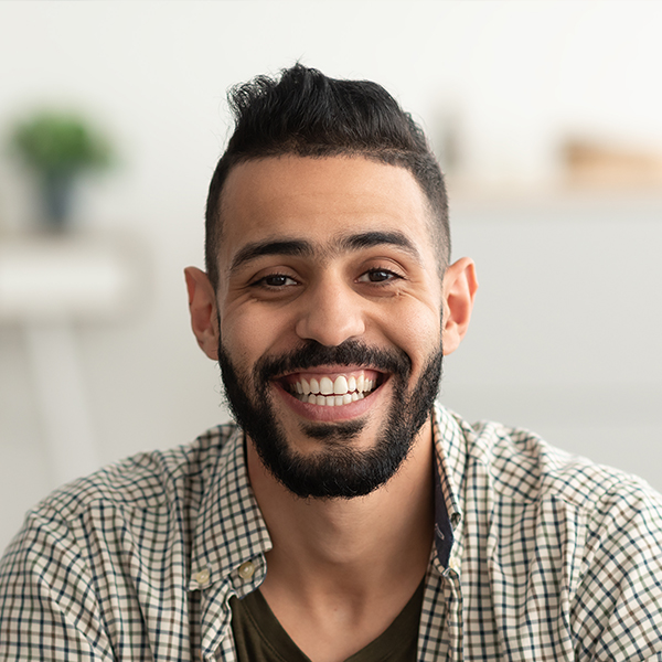 portrait-of-handsome-young-arab-man-smiling-and-lo-XHBVC4Z.jpg